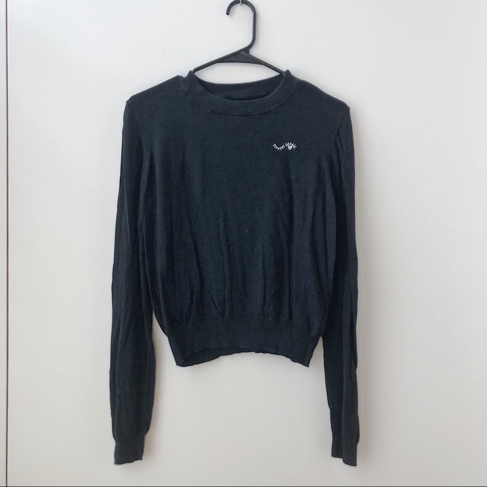 Embroidered Winking Lashes Black Crew Neck Long Sleeve Sweater